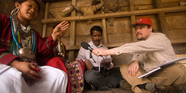 Kachim, a speaker of the hidden language Koro, talks to National Geographic Fellow Gregory Anderson. Anderson and a team made the first known recordings of Koro, an endangered language that is new to science.