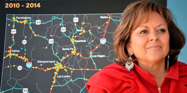 New Mexico Gov. Susana Martinez stands in front of a state map of drunken-driving deaths during a news conference in Albuquerque, N.M. on Monday, Dec. 7, 2015. A recording from a Santa Fe police sergeant's belt tape suggests Martinez was inebriated the night police responded to a complaint at a downtown hotel where the governor was hosting a holiday party. Santa Fe Police released the recording, Tuesday, Dec. 22, 2015, shedding more light on the Dec. 13 incident at the Eldorado Hotel and Spa. A clerk initially called dispatchers to report noise and that someone was throwing bottles from a hotel balcony. (AP Photo/Russell Contreras, File)