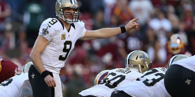 LANDOVER, MD - NOVEMBER 15: Quarterback Drew Brees #9 of the New Orleans calls a play against the Washington Redskins in the second half at FedExField on November 15, 2015 in Landover, Maryland. The Washington Redskins won, 47-14. (Photo by Patrick Smith/Getty Images)