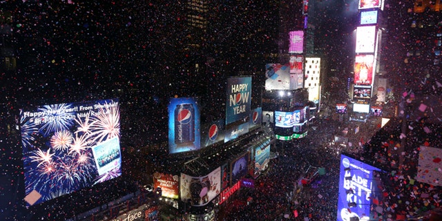 Confetti flies over New York's Times Square after the clock strikes midnight during the New Year's Eve celebration in 2013.