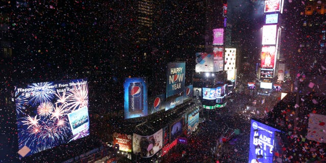 Confetti flies over New York's Times Square on New Year's Eve 2013.