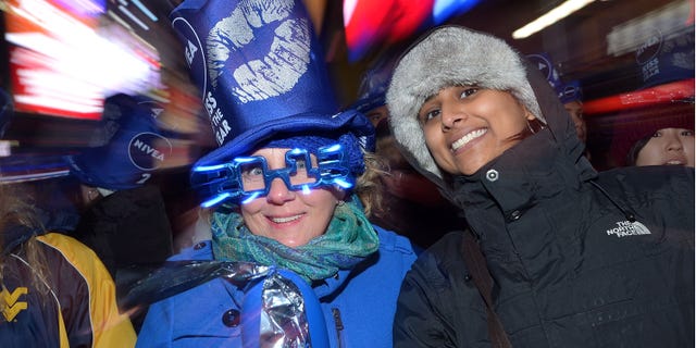 NEW YORK, NY - DECEMBER 31: A view of spectators during New Year's Eve 2013 In Times Square at Times Square on December 31, 2012 in New York City. (Photo by Mike Coppola/Getty Images)