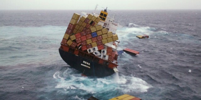 Oct. 12, 2011: Shipping containers float in the water around the cargo ship Rena that has been foundering since it ran aground Oct. 5 on the Astrolabe Reef, about 14 miles from Tauranga Harbour, New Zealand.