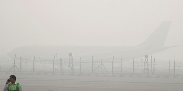 The airline has temporarily suspended flights to New Delhi as toxic smog enshrouds India's capital city.