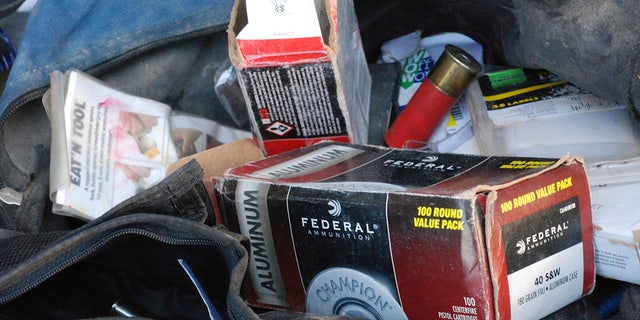 Ammunition for firearms was left behind at a squalid makeshift living compound in Amalia, New Mexico, on Friday,