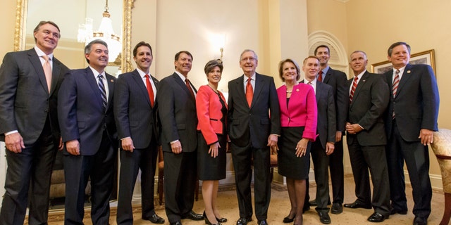 Nov. 12, 2014: Senate Minority Leader Mitch McConnell flanked by 10 newly-elected GOP senators. Washington, D.C .