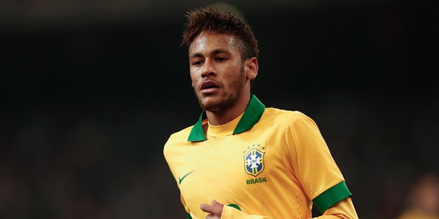 BEIJING, CHINA - OCTOBER 15: Neymar of Brazil in action during the international friendly match between Brazil and Zambia at Beijing National Stadium on October 15, 2013 in Beijing, China. (Photo by Lintao Zhang/Getty Images)