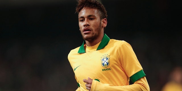 BEIJING, CHINA - OCTOBER 15: Neymar of Brazil in action during the international friendly match between Brazil and Zambia at Beijing National Stadium on October 15, 2013 in Beijing, China. (Photo by Lintao Zhang/Getty Images)