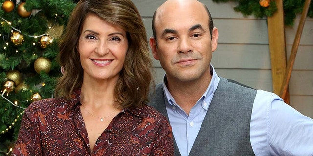 Nia Vardalos and her husband, actor Ian Gomez, have annouced that they are getting a divorce after 25 years of marriage. Here the pair pose on set of "The Great American Baking Show" which the co-hosted together.