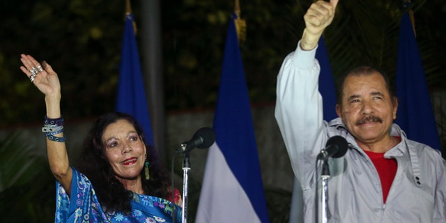 Daniel Ortega and his wife after casting their ballots in Managua, Nicaragua, Sunday, Nov. 6, 2016.