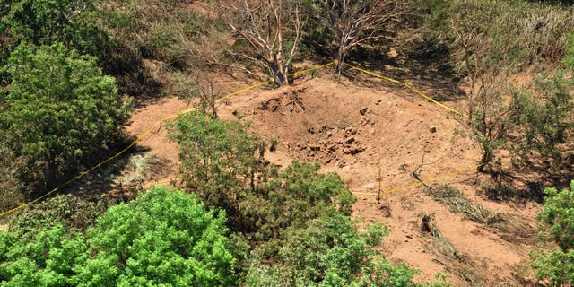 Sept. 7, 2014: An impact crater made by a small meteorite in a wooded area near Managua's international airport and an air force base.