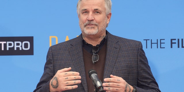 Nick Cassavetes speaks at a ceremony where Rowlands places hand and footprints in the forecourt of the TCL Chinese Theatre in Los Angeles December 5, 2014.