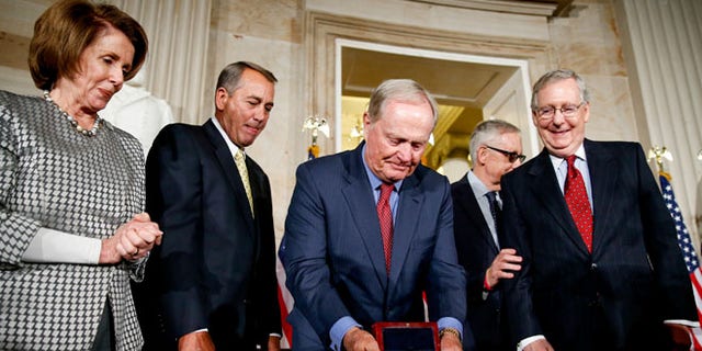 March 24, 2015: Retired golf pro Jack Nicklaus, center, on Capitol Hill, in Washington. D.C., with, from left Reps. Nancy Pelosi and John Boehner and Senators Harry Reid and Mitch McConnell.