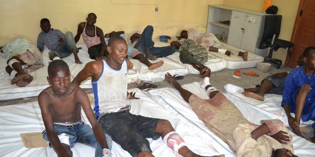 Sept. 21, 2015 - Victims receive treatment at a hospital, after an explosion in Maiduguri, Nigeria. Extremists detonated 3 explosive devices in Maiduguri, a military official said Sunday.