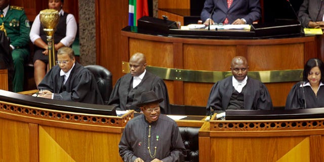 May 7, 2013: Nigerian President Goodluck Jonathan, center, makes a speech in the South African Parliament in Cape Town.