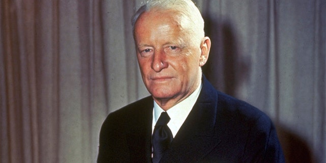 This undated file photo shows Adm. Chester W. Nimitz, commander of U.S. Naval forces in the Pacific during World War II, sitting on a desk in an unknown location.
