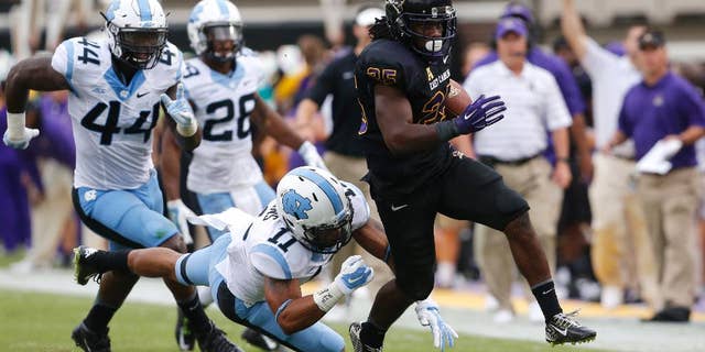 FILE - In this Sept. 20, 2014, file photo, East Carolina running back Breon Allen (25) beats North Carolina's Malik Simmons while scoring a 44-yard touchdown during the first half of their NCAA college football game at Dowdy-Ficklen Stadium in Greenville, N.C. Allen turned in a huge rushing day in the win that pushed East Carolina into the national rankings. Allen's emergence could help replace the rushing production lost from last season for the No. 22 Pirates, who make their American Athletic Conference debut Saturda, Oct. 4, 2014, against SMU. (AP Photo/The News & Observer, Ethan Hyman, File)