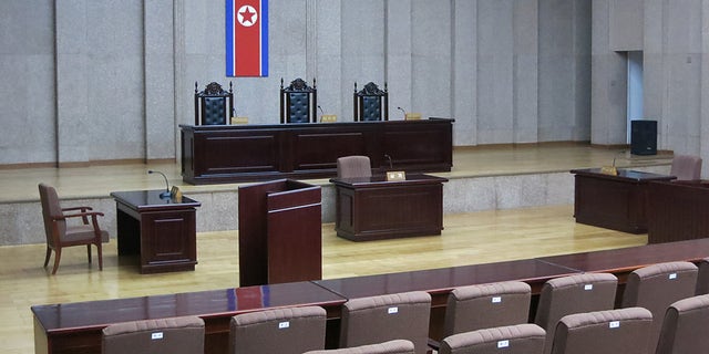 In this photo a North Korean flag hangs inside the interior of Pyongyangs Supreme Court.