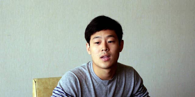 Won Moon Joo, a South Korean student at New York University, is interviewed at the Koryo Hotel in Pyongyang, North Korea Tuesday, July 14, 2015. Joo, who is being detained in North Korea says he hopes to be released soon and has told his family not to worry too much about him.  Joo was presented to the media in North Korea’s capital, Pyongyang, on Tuesday. (AP Photo/Kim Kwang Hyon)