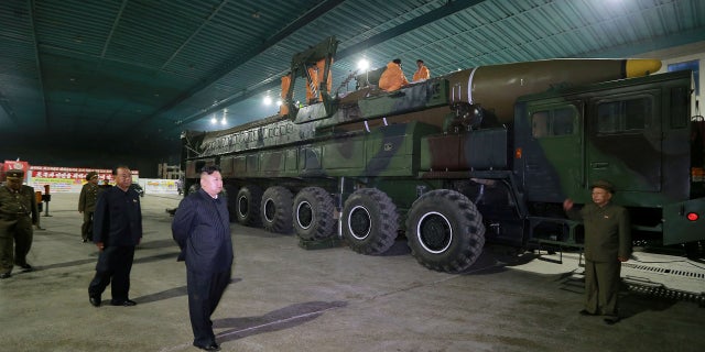 North Korean leader Kim Jong Un inspects the intercontinental ballistic missile Hwasong-14 in this undated photo released by North Korea's Korean Central News Agency (KCNA) in Pyongyang July 5, 2017. KCNA/via REUTERS ATTENTION EDITORS - THIS IMAGE WAS PROVIDED BY A THIRD PARTY. REUTERS IS UNABLE TO INDEPENDENTLY VERIFY THIS IMAGE. NO THIRD PARTY SALES. SOUTH KOREA OUT. - RTX3A3G0