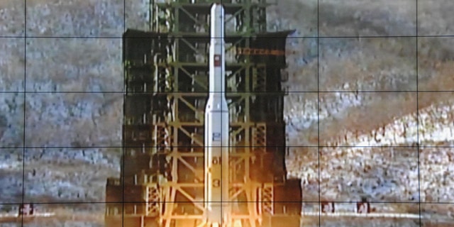 Dec. 12, 2012: A screen shows a rocket being launched from a launch pad at the West Sea Satellite Launch Site, at North Korea's satellite control centre in Cholsan county, North Pyongan province, in this photo released by Kyodo News.