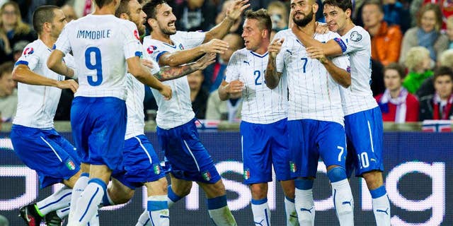 Italy's Simone Zaza, second righ, celebrates scoring against Norway with teammates during their Euro 2016 qualifying match at Ullevaal Stadium in Oslo, Tuesday Sept. 9, 2014. (AP Photo/Vegard Wivestad Grott, NTB Scanpix) NORWAY OUT