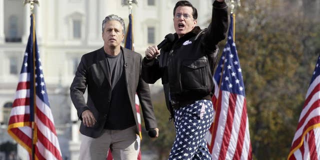 John Stewart and Stephen Colbert at Restoring Sanity and/or Fear Rally Sunday/AP photo