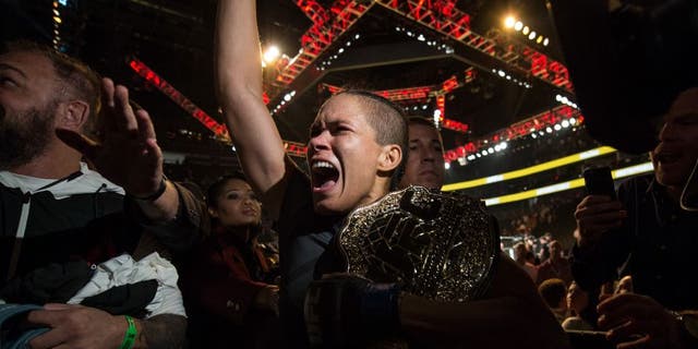 LAS VEGAS, NV - JULY 09: Amanda Nunes of Brazil exits the Octagon after defeating Miesha Tate during the UFC 200 event on July 9, 2016 at T-Mobile Arena in Las Vegas, Nevada. (Photo by Brandon Magnus/Zuffa LLC/Zuffa LLC via Getty Images)