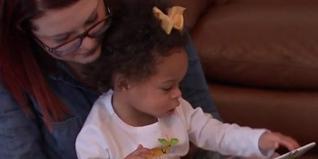 Hamm went through the proper channels within the Florida Department of Children and Families to adopt; in the process, she learned Delilah had a sister named Caroline who was also in the hospital and adopted her too.