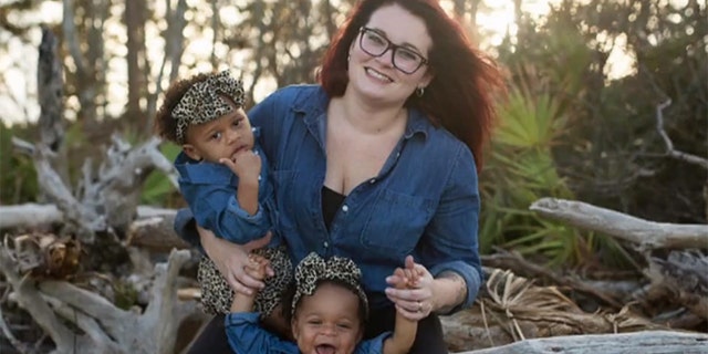 Jess Hamm first met and fell in love with twin sisters, Delilah and Caroline, when they were admitted to Wolfson Children’s Hospital for a non-accidental trauma.