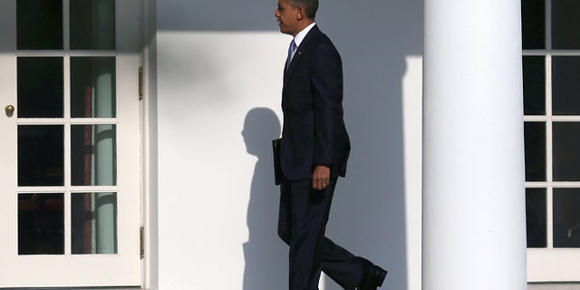 WASHINGTON, DC - AUGUST 21: U.S. President Barack Obama walks toward the Oval Office before departing on Marine One at the White House, on August 21, 2012 in Washington, DC. President Obama is traveling to Ohio, Nevada and New York to continue campaigning. (Photo by Mark Wilson/Getty Images)