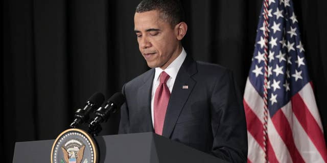 President Obama makes a statement on Libya from Brazil