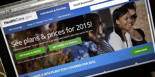 FILE - In this Nov. 12, 2014 file photo, the HealthCare.gov website, where people can buy health insurance, is seen on a laptop screen in Portland, Ore. (AP Photo/Don Ryan, File)