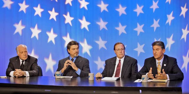 West Virginia senatorial candidates Republican John Raese, Mountain Party candidate Jesse Johnson, and Constitutional Party candidate Jeff Becker, in Morgantown, W.Va. on Monday, Oct. 18, 2010/AP Photo