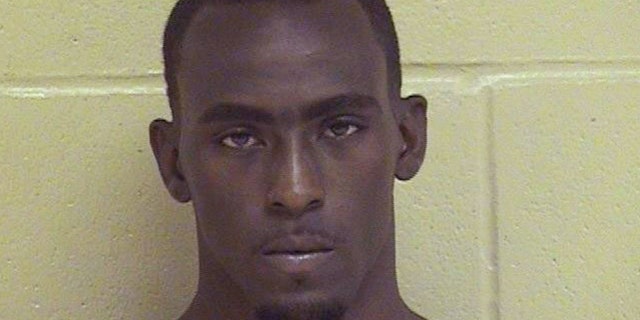 This undated booking photo released by the Shreveport Police Department shows Grover Cannon, named as a suspect in the shooting death of Shreveport police officer Thomas LaValley, Wednesday, Aug. 5, 2015. LaValley, 24, was shot multiple times while answering a call about a suspicious person at a home in the city's Queensborough neighborhood, according to police. (Shreveport Police Department via AP)
