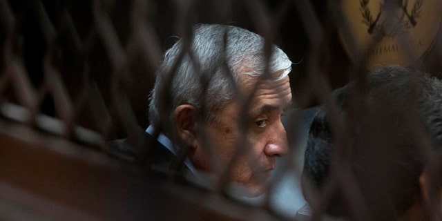 Guatemala's former president Otto Pérez Molina sits in court in Guatemala City, Sept. 8, 2015.