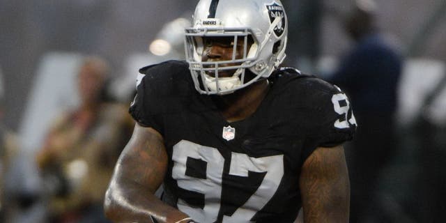 August 14, 2015; Oakland, CA, USA; Oakland Raiders defensive end Mario Edwards Jr. (97) lines up during the second quarter in a preseason NFL football game against the St. Louis Rams at O.co Coliseum. The Raiders defeated the Rams 18-3. Mandatory Credit: Kyle Terada-USA TODAY Sports