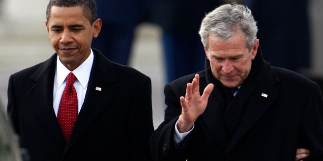 Jan. 20, 2009: President Obama escorts former President Bush to a waiting helicopter behind the U.S. Capitol after Obama's inauguration ceremony in Washington.