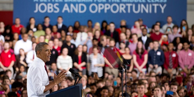 President Barack Obama gestures as he speaks about the economy, jobs, and manufacturing, Wednesday, Jan. 15, 2014, at North Carolina State University in Raleigh, N.C. (AP Photo/Carolyn Kaster)