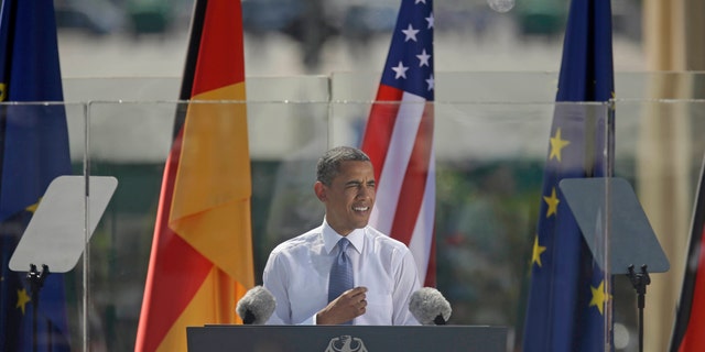 President Barack Obama speaks in front of the iconic Brandenburg Gate in Berlin Germany, Wednesday, June 19, 2013. Obama is planning a major push using executive powers to tackle the pollution blamed for global warming in an effort to make good on promises he made at the start of his second term. "We know we have to do more and we will do more," Obama said in Berlin. (AP Photo/Pablo Martinez Monsivais)