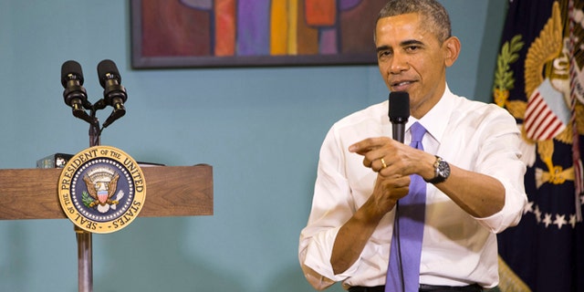 This Tuesday, Dec. 9, 2014 photo shows, President Barack Obama immigration town hall at Casa Azafran in Nashville, Tenn.