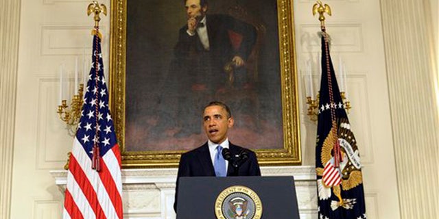 President Barack Obama speaks in the State Dining Room at the White House Saturday, Nov. 23, 2013, in Washington. The United States and Iran secretly engaged in a series of high-level, face-to-face talks over the past year, in a high-stakes diplomatic gamble by the Obama administration that paved the way for the historic deal sealed in Geneva aimed at slowing Tehran's nuclear program, The Associated Press has learned. (AP Photo/Susan Walsh)