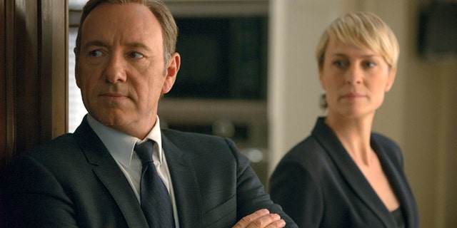 This image released by Netflix shows Kevin Spacey as Francis Underwood, left, and Robin Wright as Clair Underwood in a scene from "House of Cards." The second season of the popular original series premieres on Friday, Feb. 14, 2014 on Netflix. (AP Photo/Netflix, Nathaniel E. Bell)