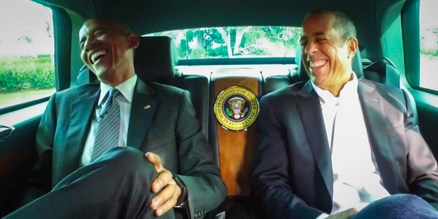This framegrab image provided by Crackle and comediansincarsgettingcoffee.com, shows President Barack Obama with Jerry Seinfeld in a scene from a Comedians in Cars Getting Coffee. The president and Seinfeld compare cars and trade one-liners in a 19-minute episode of Comedians In Cars Getting Coffee. The episode began airing Wednesday night. (Crackle and comediansincarsgettingcoffee.com via AP)