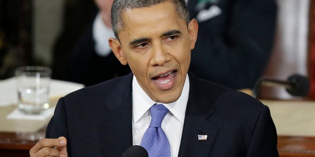 Feb. 12, 2013: President Obama gestures as he gives his State of the Union address during a joint session of Congress on Capitol Hill in Washington.