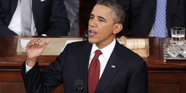January 24, 2012: President Barack Obama delivers the State of the Union address as Vice President Joe Biden and House Speaker John Boehner of Ohio listen in the U.S. Capitol in Washington.