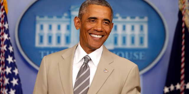 In this Thursday, Aug. 28, 2014 file photo, President Barack Obama in the James Brady Press Briefing Room of the White House in Washington.