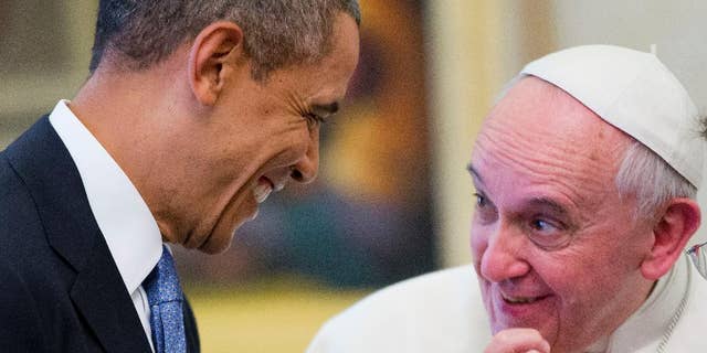 US President Barack Obama meets with Pope Francis, Thursday, March 27, 2014 at the Vatican. Obama called himself a "great admirer" of Pope Francis as he sat down at the Vatican Thursday with the pontiff he considers a kindred spirit on issues of economic inequality. Their historic first meeting comes as Obama's administration and the church remain deeply split on issues of abortion and contraception. On the right is Msgr. Mark Miles, who was the english translator for the Pontiff. (AP Photo/Pablo Martinez Monsivais)