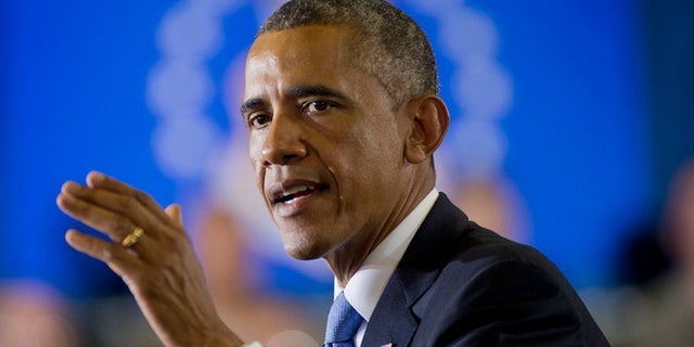 In this Wednesday, Sept. 17, 2014 photo, President Barack Obama speaks at US Central Command (CentCom) at MacDill Air Force Base, Fla.