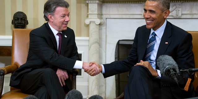 WASHINGTON, DC - FEBRUARY 04: U.S. President Barack Obama meets with Colombian President Juan Manuel Santos in the Oval Office of the White House on February 4, 2016 in Washington, DC. Obama and Santos are expected to make a bid for increased aid for Colombia and talk about "Plan Colombia", a U.S. aid initiative started in 2000 to help combat Colombian drug cartels. (Photo by Shawn Thew - Pool/Getty Images)